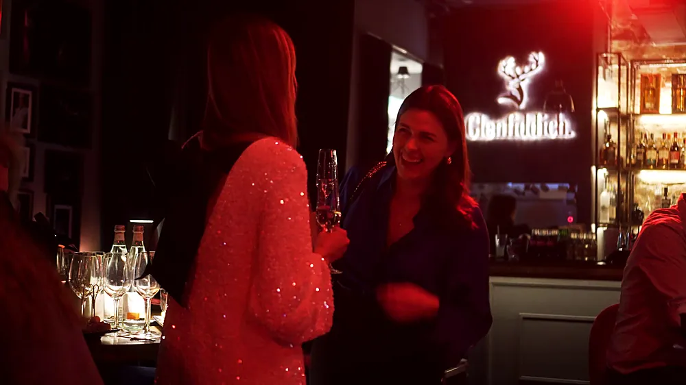 A conversation at the after-party bar