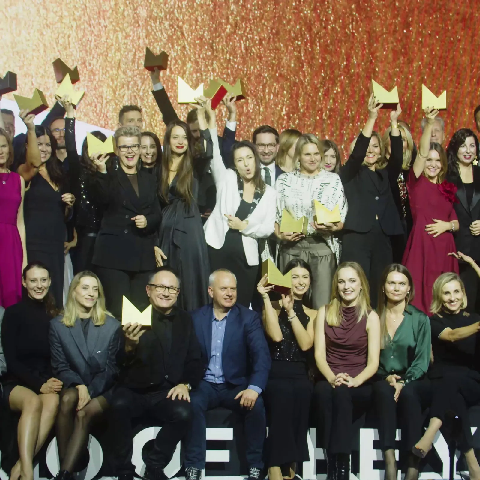Marketing Director of the Year winners raise their statuettes on the Gala stage