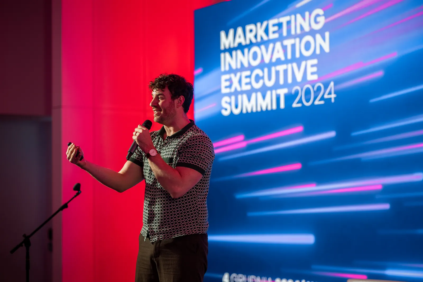 A speaker on the Executive Summit 2024 stage